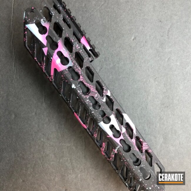 Pink Neon Splatter On Mcx Rail Coated With Cerakote In Armor Black, Prison Pink And Ice Blue
