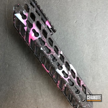 Pink Neon Splatter On Mcx Rail Coated With Cerakote In Armor Black, Prison Pink And Ice Blue
