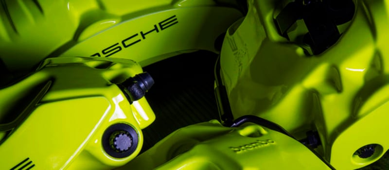 porsche-brembo-brake-calipers-in-a-neon-yellow-and-casper-clear-finish-example