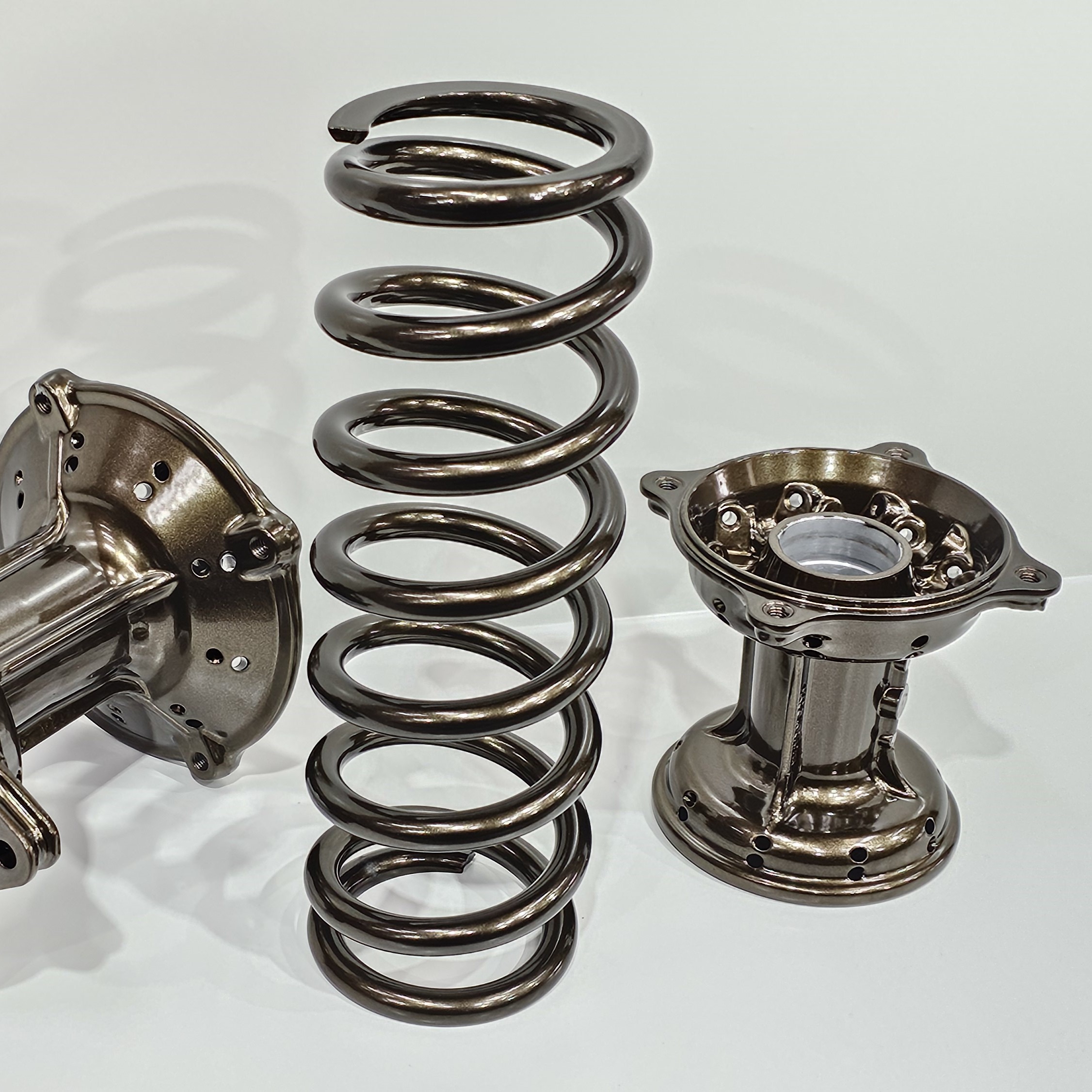 Motorcycle Hubs & Springs in Bronze Chrome | Prismatic Powders