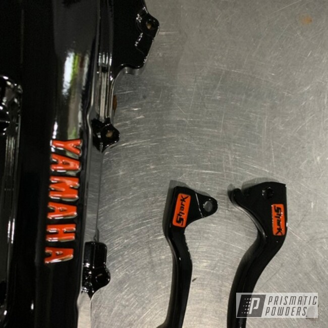 Motorcycle Parts Powder Coated In Clear Vision, Obsidian Black And Magma Red