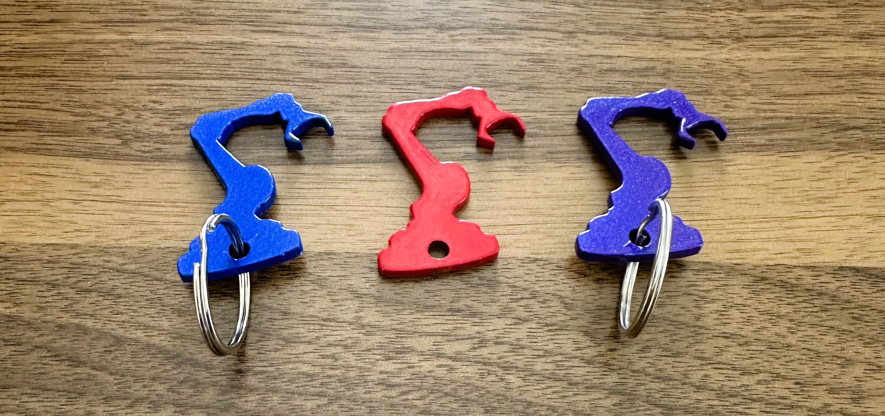 Pressed Powder On Key Chain Custom robot arm keychains | Prismatic Powders