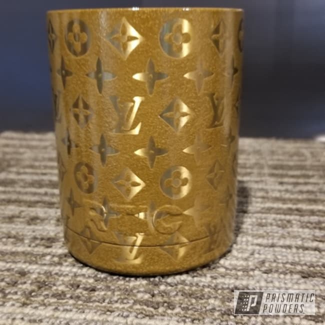 https://images.nicindustries.com/prismatic/projects/11574/powder-coated-gold-rtic-can-koozie-thumbnail.jpg?1551462430&size=1024