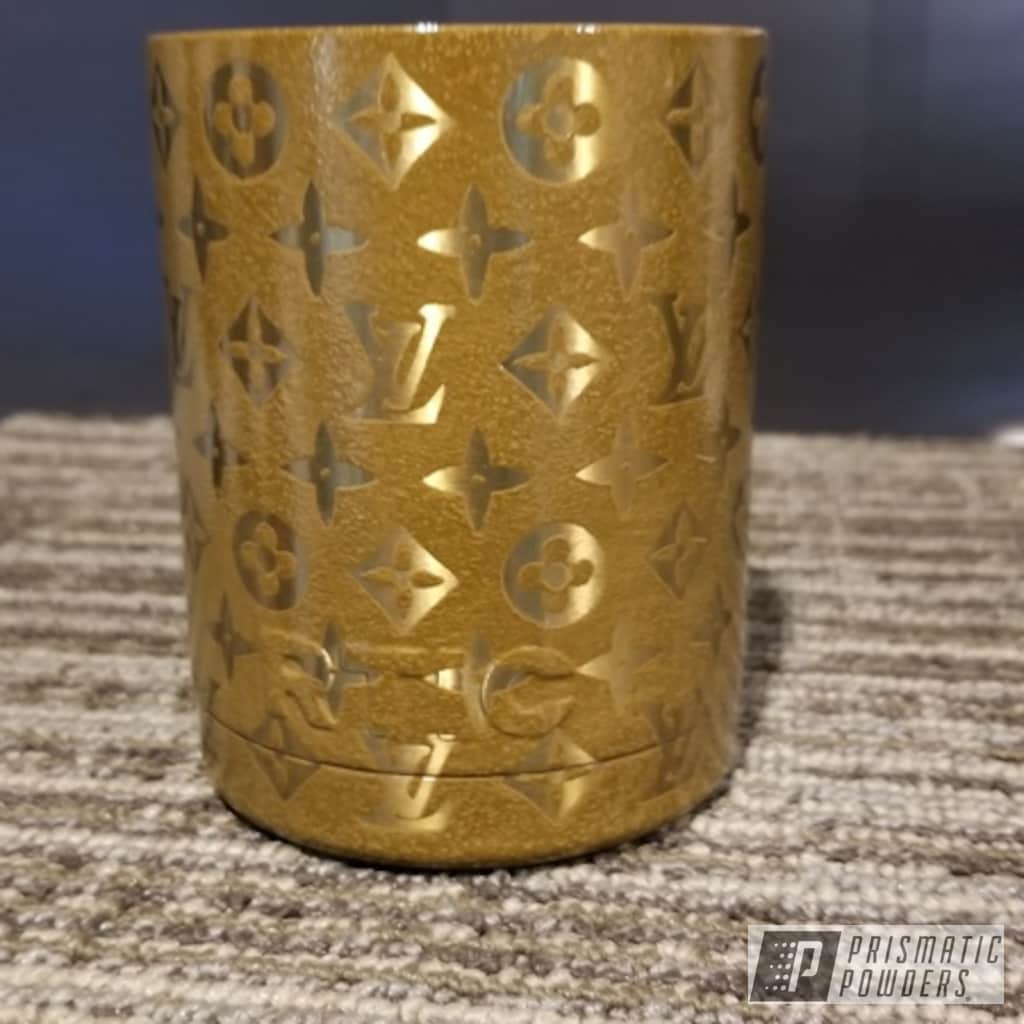 https://images.nicindustries.com/prismatic/projects/11574/powder-coated-gold-rtic-can-koozie-thumbnail.jpg?1551462430&size=1024