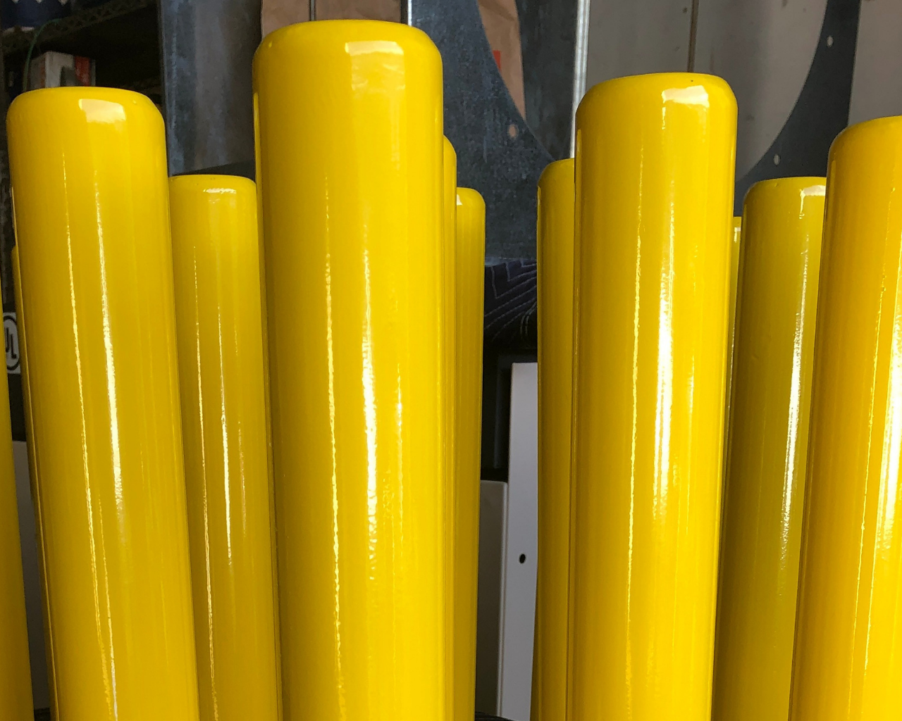 Parking Pilings done in RAL 1023 (Traffic Yellow) | Prismatic Powders