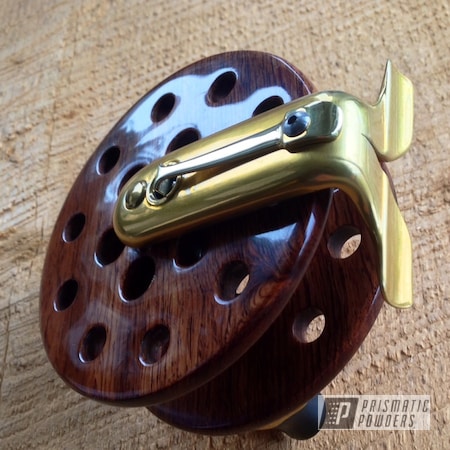 Powder Coating: powder coating,Miscellaneous,Custom fishing reel,Prismatic Powders,4" Spey Reel in Rosewood,Buttered Brass PPS-1547,powder coated