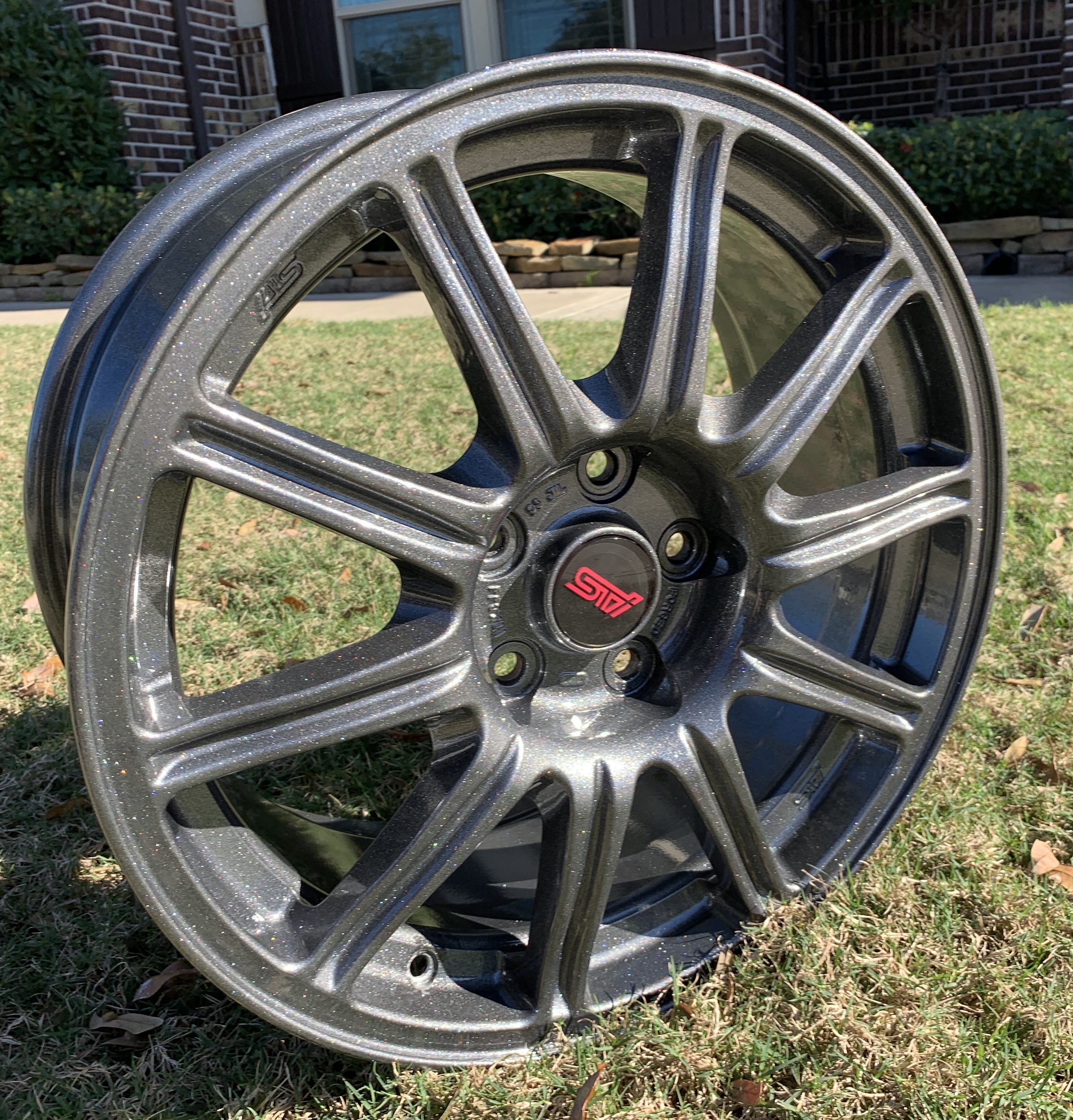 Custom Subaru STI Rims done in Silver Sparkle and Kingsport Grey ...