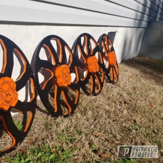 Powder Coated Orange And Black Two Toned Polaris Wheels