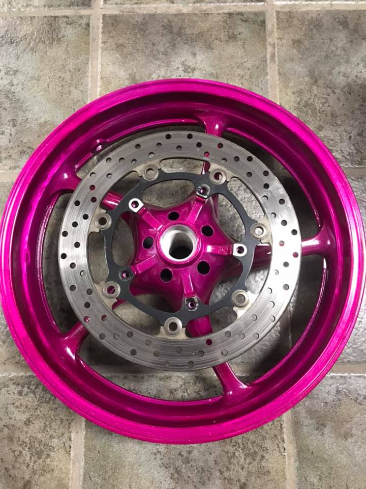 Motorcycle Wheels coated in Racing Raspberry | Prismatic Powders