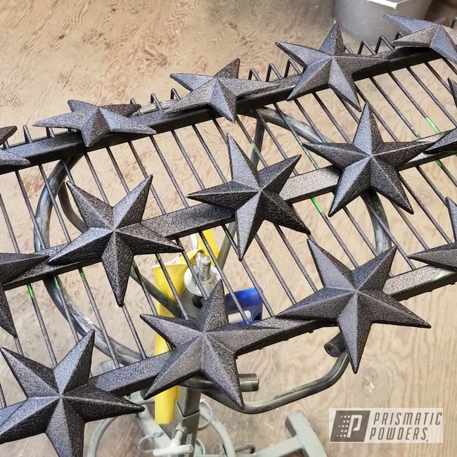 https://images.nicindustries.com/prismatic/projects/59666/powder-coated-decorative-metal-stars-in-pws-4344-1.jpg?1593012709&size=1024