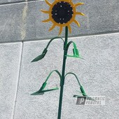 Sunflower Yard Art Done In A Green And Yellow Finish Prismatic Powders
