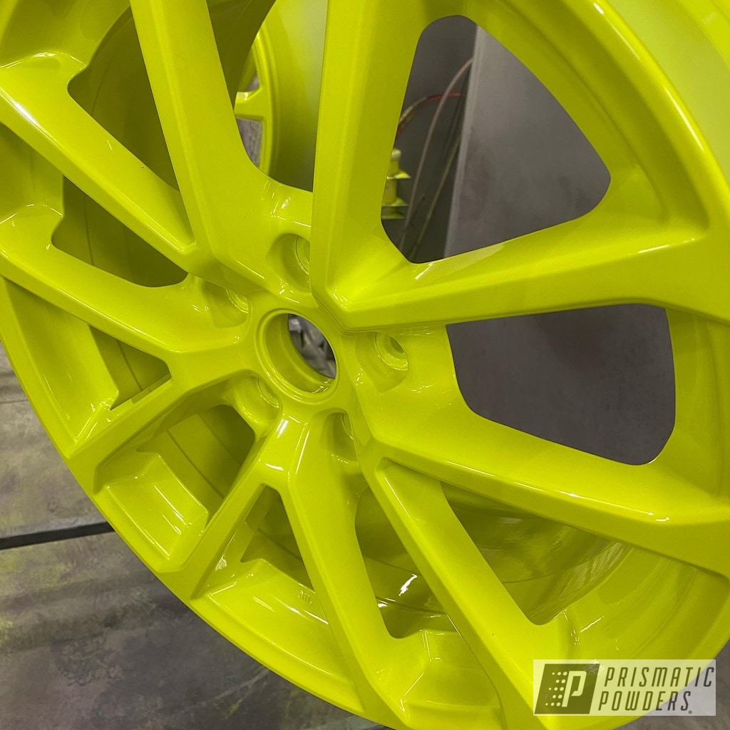 Two Stage Application Wheels Coated In Shocker Yellow And Gloss White Prismatic Powders Two Stage Application Wheels Coated In Shocker Yellow And Gloss White Prismatic Powders
