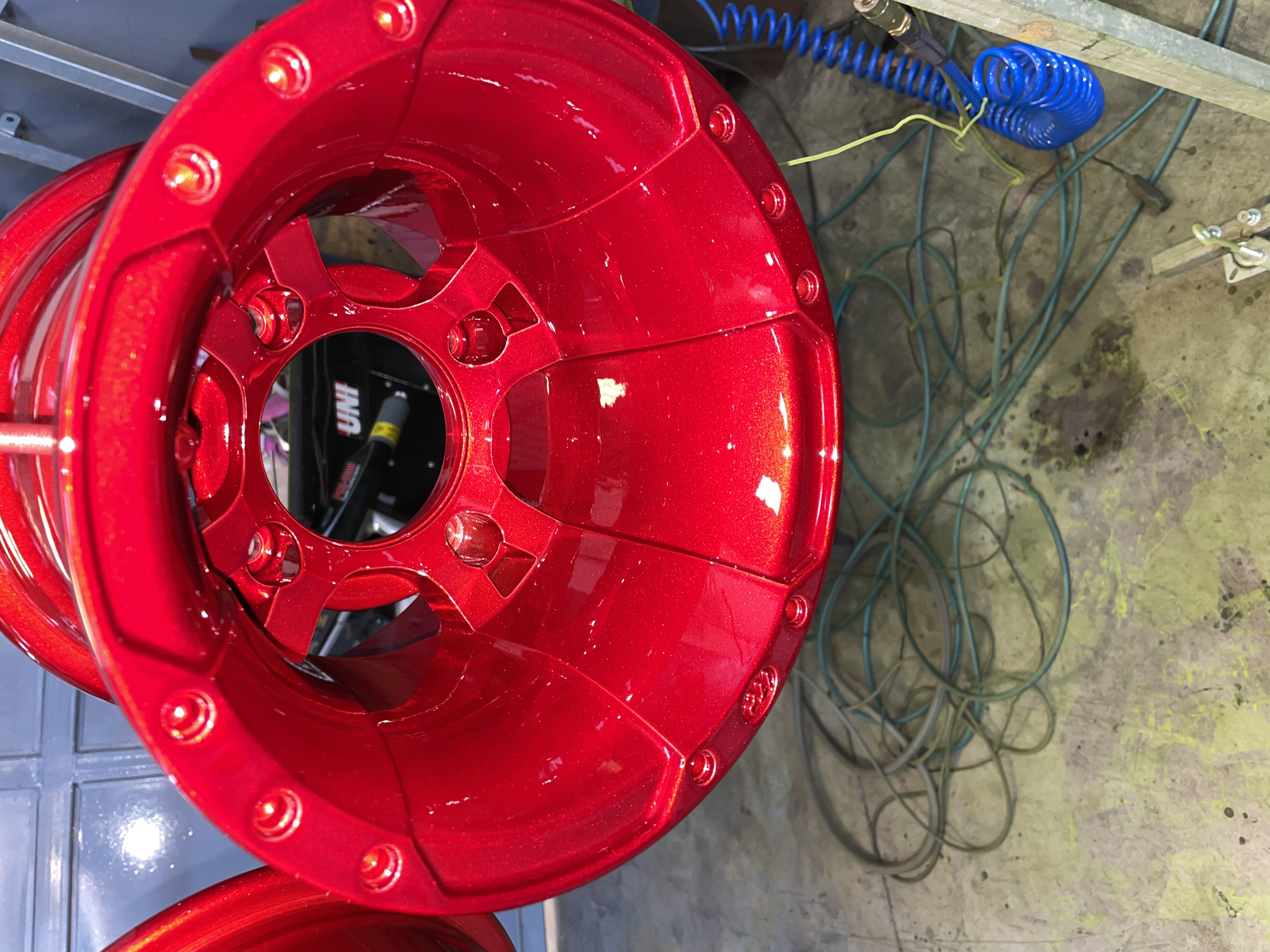 Powder Coated Raptor Rims ATV Wheels Done in Heavy Silver and Deep Red | Prismatic Powders