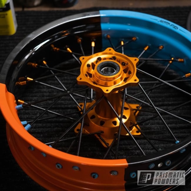 Powder Coated Supermoto Wheels In Gumball Blue, Clear Vision And Pumpkin Gold 
