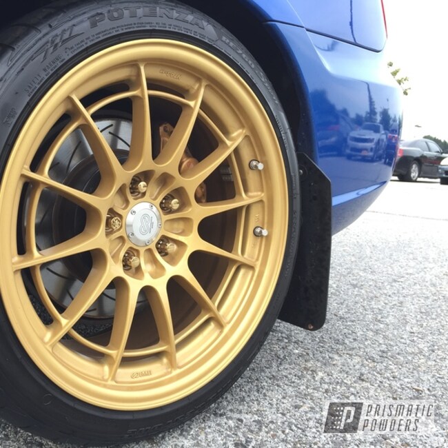 Goldtastic And Clear Vision Powder Caot On A Set Of Enkei Wheels