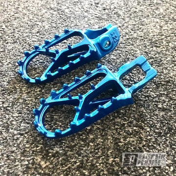 Motorcycle Foot Pegs Powder Coated In Anodized Blue And Polished Aluminum  