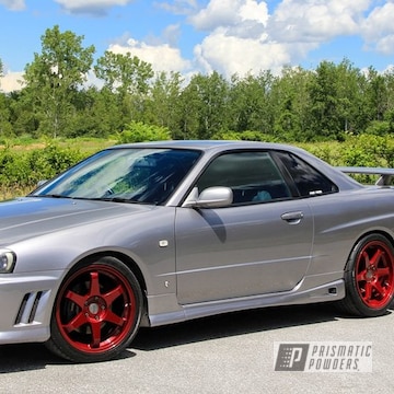 Custom Nissan Skyline Gt-t Wheels Featuring Illusion Cherry With A Clear Vision Top Coat