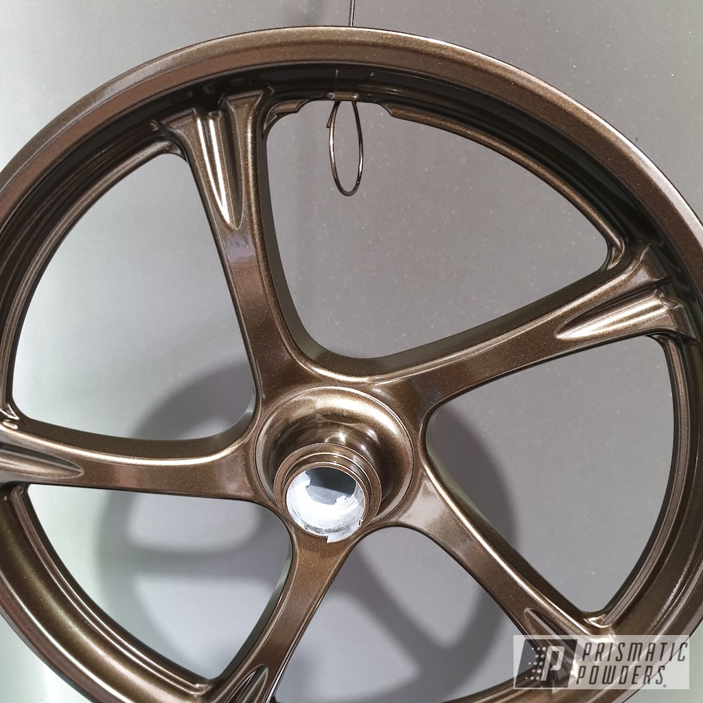 Motorcycle Wheel Finished with Bronze Chrome | Prismatic Powders