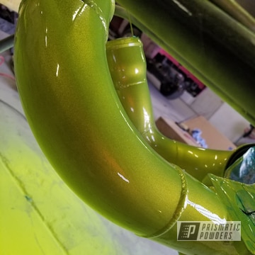 Intercooler Turbo Piping Coated Using Shocker Yellow Over An Alien Silver Base Coat