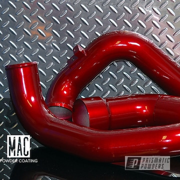 Illusion Cherry And Clear Vision Over A Set Of Cold Air Intake Pipes