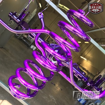 Custom Suspension Parts Coated In Illusion Purple And Clear Vision
