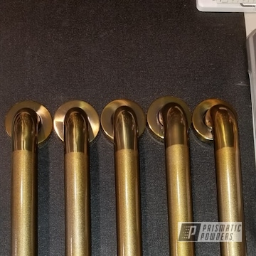 Refinished Handrails In A Transparent Gold Powder Coat