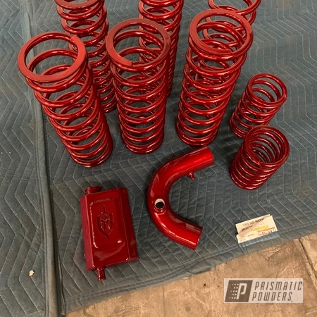 Powder Coating: Springs,A-arms,Roll Cage,ROOF,LOLLYPOP RED UPS-1506,Coil Spring,Snowcone White PSS-4369,Trailing Arms,UTV