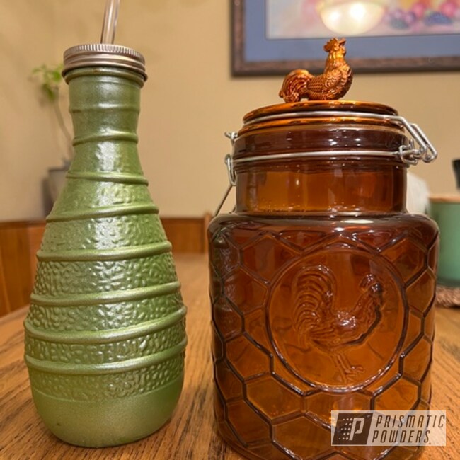 Powder Coated Fractured Apple And Transparent Copper Glass Bottles
