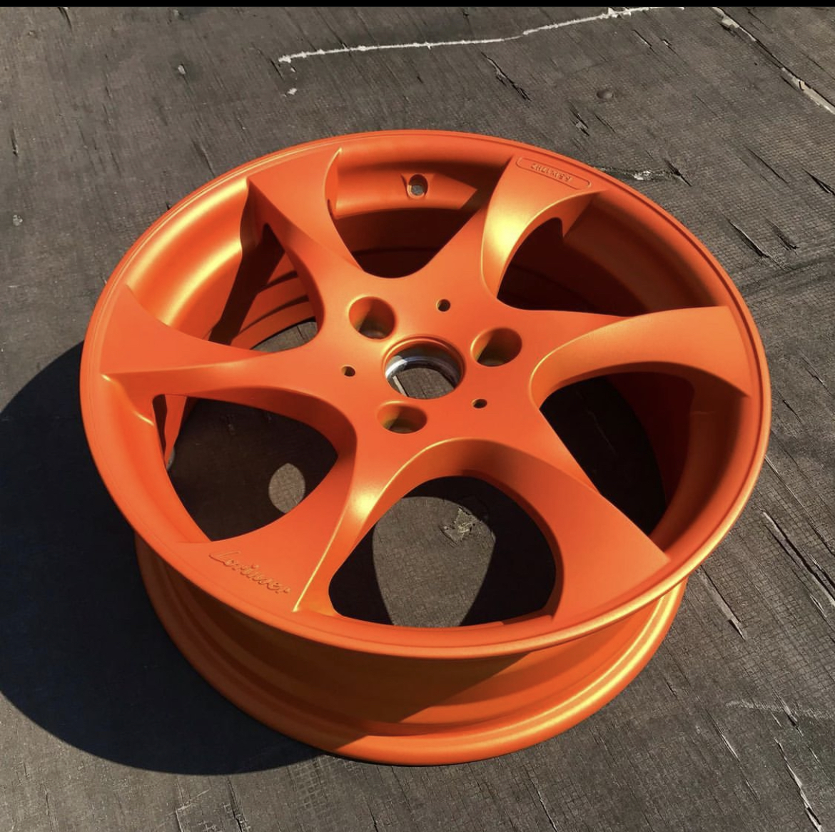 Wheel coated in Pms-4620 and Pps-4005 | Prismatic Powders