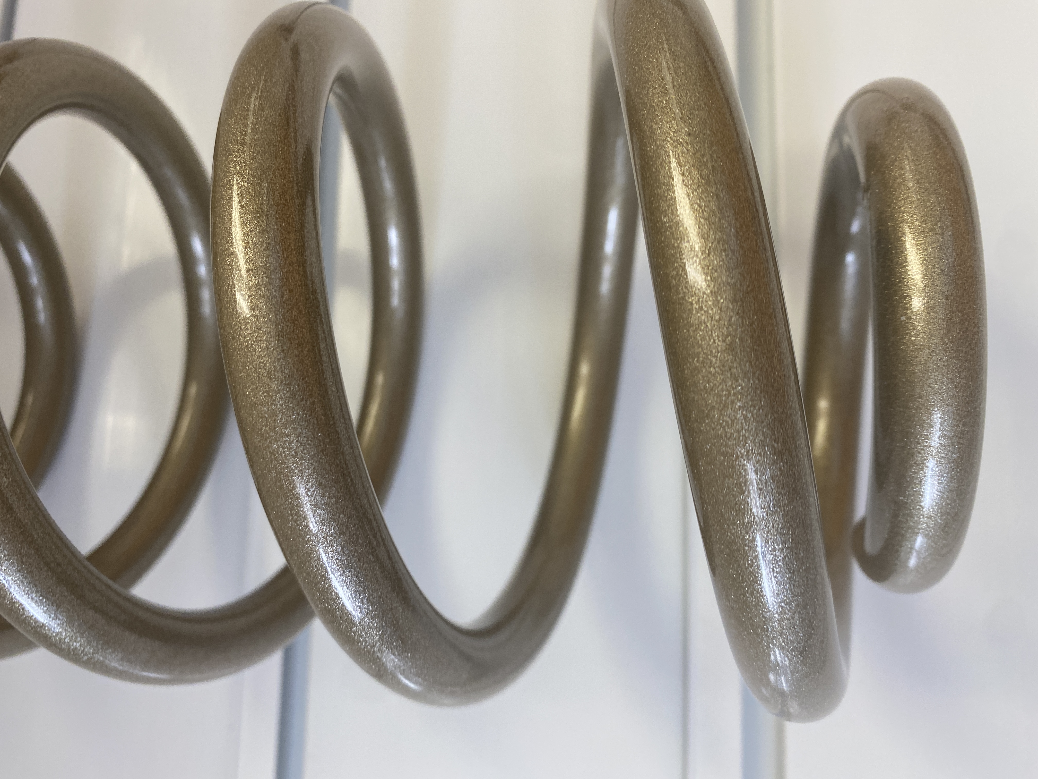 Spring Coated in UMB-1638 | Prismatic Powders