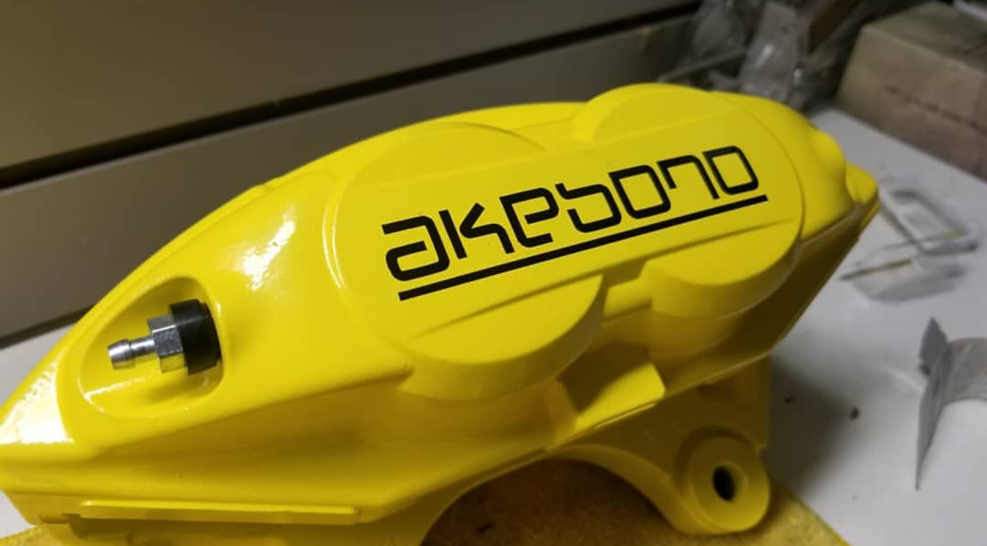Powder Coating Brakes Rotor Glowing Yellow, powder coated Akebono calipers going on a 2017 Maxima ...