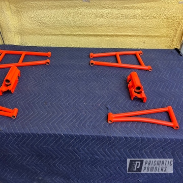 Powder Coated Orange Glow Control Arms And Spindles