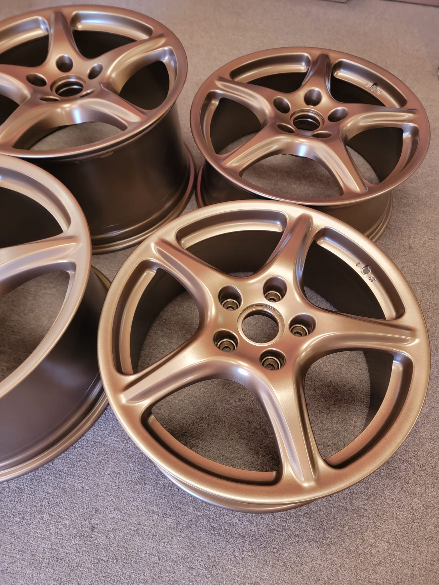 Unrevealed Rim Wheels Featuring a Highland Bronze Finish | Prismatic Powders