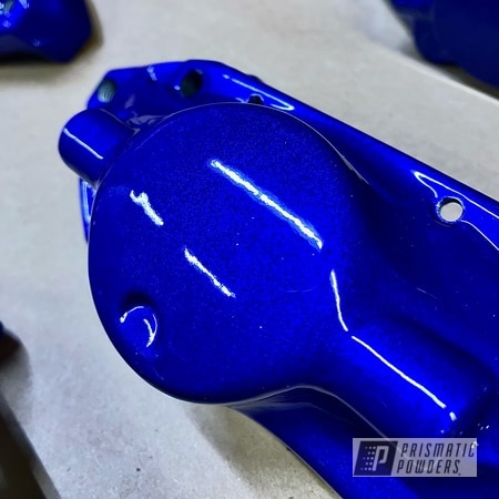 Powder Coating: Custom Brake Calipers,LOLLYPOP BLUE UPS-2502,Heavy Silver PMS-0517,Two Stage Application,Automotive,Brake Calipers