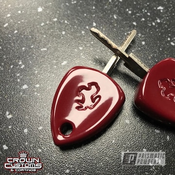 Powder Coated Ferrari Keys Refinished In Royal Maroon