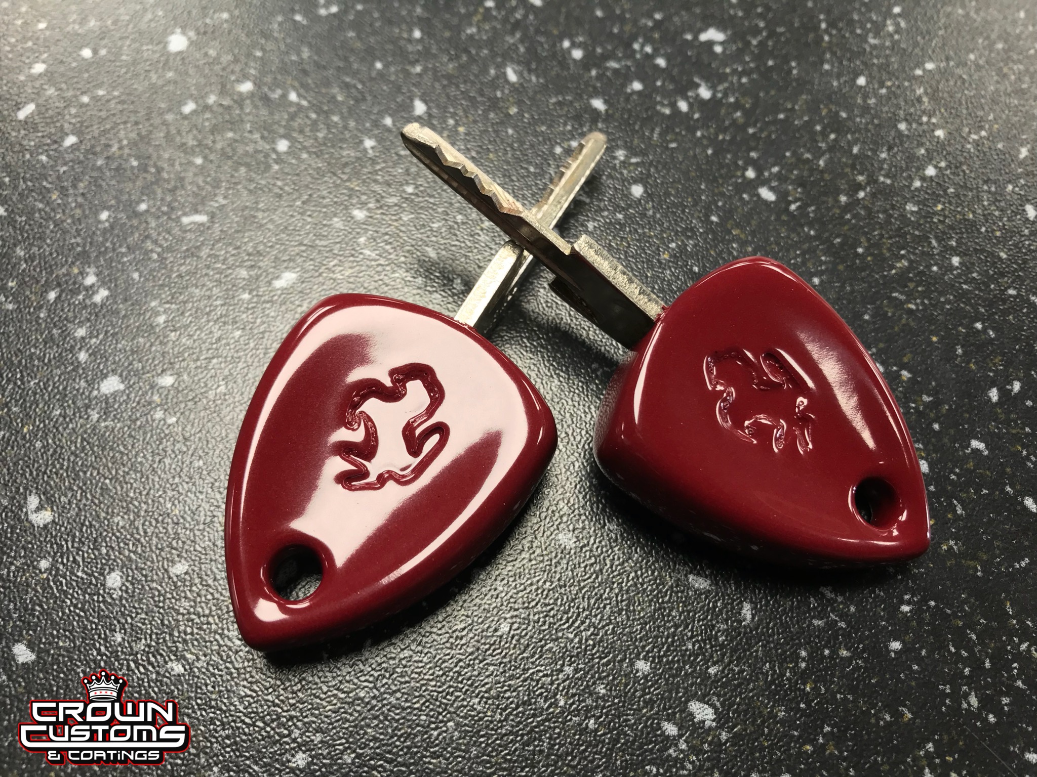 Powder Key Ferrari keys refinished in Royal Maroon | Prismatic Powders