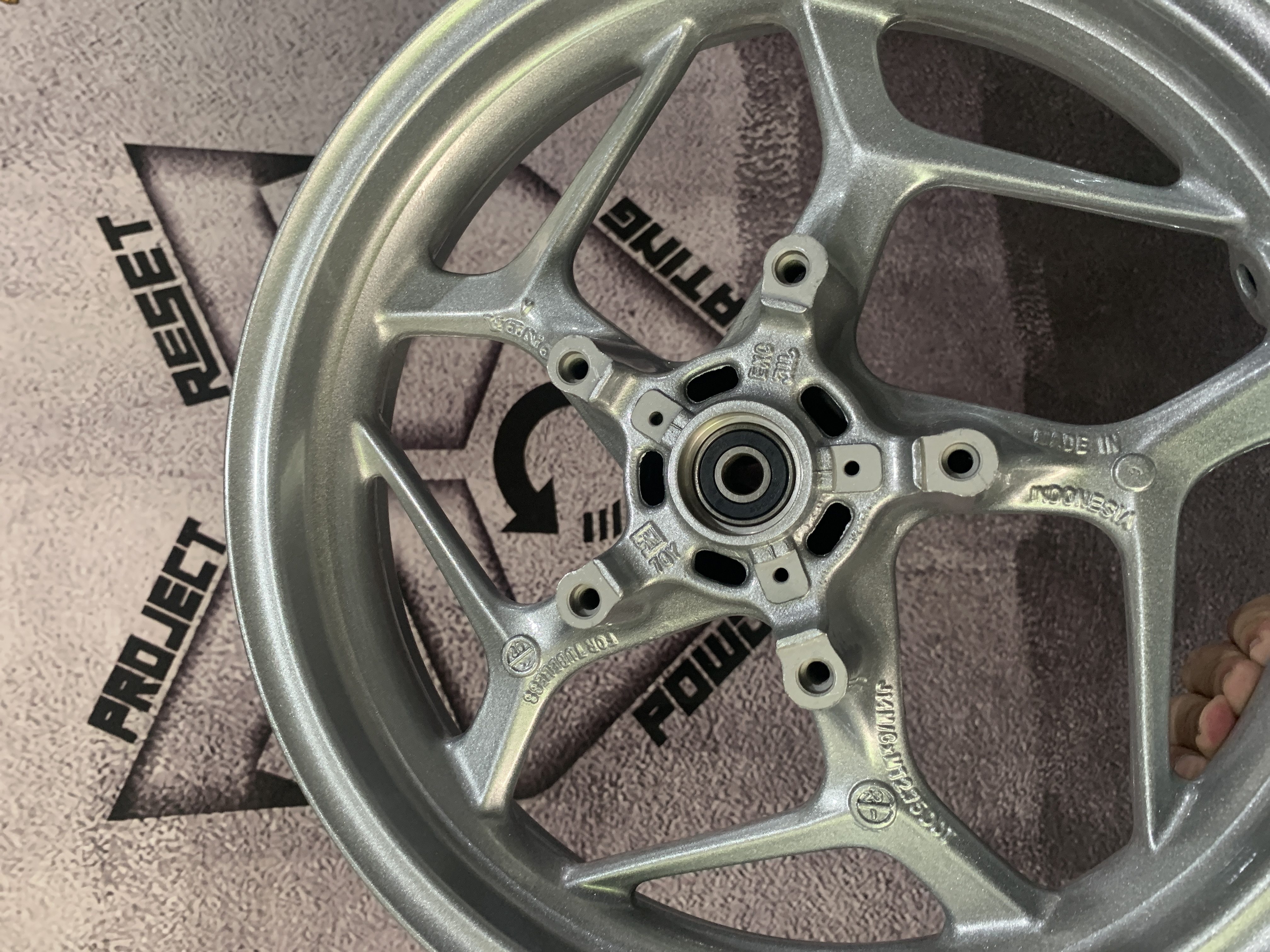 Honda PCX rims in Heavy Silver | Prismatic Powders