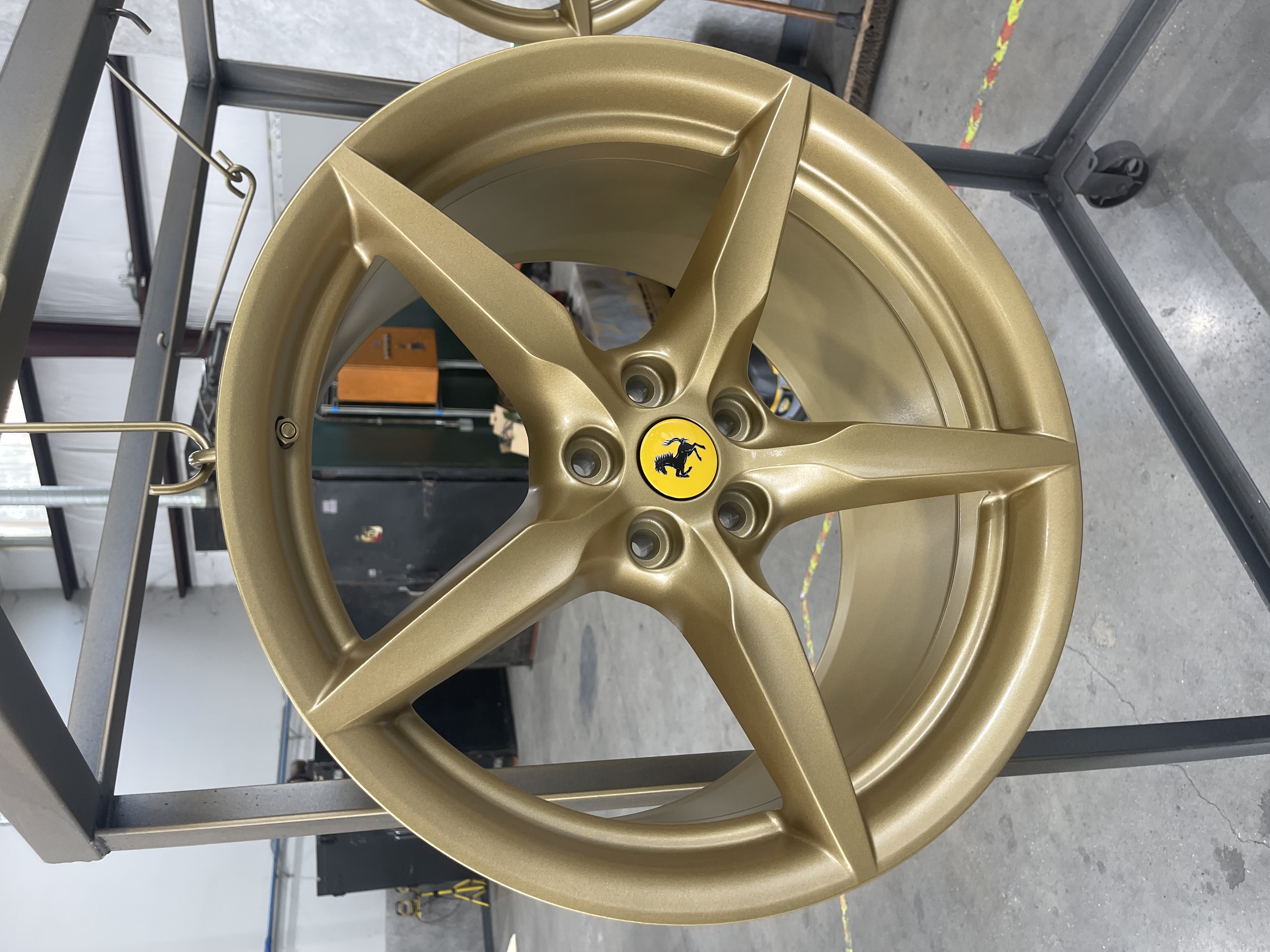 Ferrari Wheels with a Spanish Gold Finish | Prismatic Powders