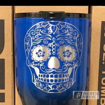 Powder Coated Tumbler In A Black And Blue Color Fade