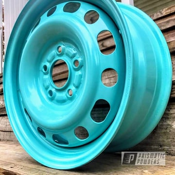 Powder Coated 15 Inch Civic Rims In A Teal Color